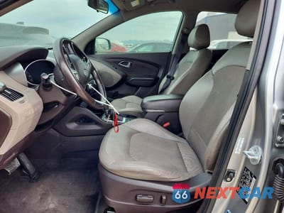 Zdjęcie 7 z 12 samochodu: 2014 HYUNDAI TUCSON SE VIN:KM8JUCAG4EU895722 - miniatura