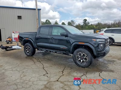 Czwarte zdjęcie samochodu z boku: 2025 GMC CANYON AT4 VIN:1GTP2DEKXS1241894 - miniatura
