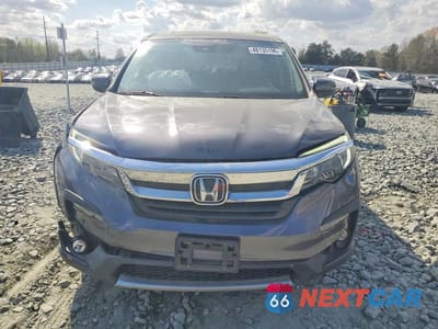 Piąte zdjęcie samochodu w środku: 2020 HONDA PILOT EXL VIN:5FNYF5H51LB020696 - miniatura