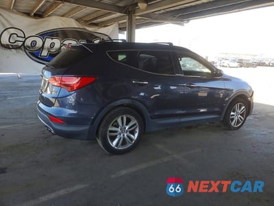 Trzecie zdjęcie samochodu z tyłu: 2014 HYUNDAI SANTA FE SPORT 2.0T VIN:5XYZUDLA8EG226005 - miniatura