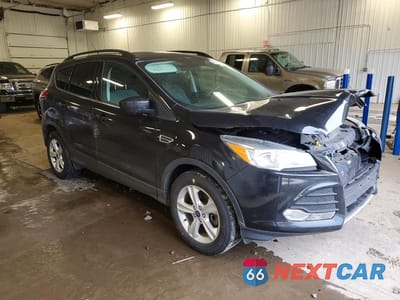 Czwarte zdjęcie samochodu z boku: 2015 FORD ESCAPE SE VIN:1FMCU9G96FUC67148 - miniatura
