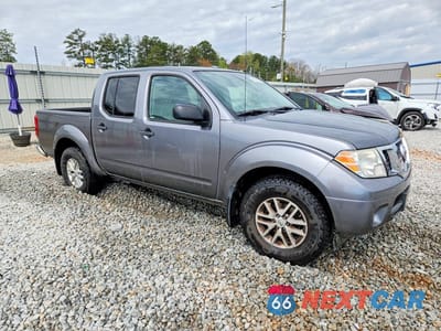 Czwarte zdjęcie samochodu z boku: 2018 NISSAN FRONTIER SV VIN:1N6DD0ER5JN735054 - miniatura