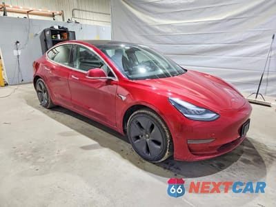 Czwarte zdjęcie samochodu z boku: 2020 TESLA MODEL 3 VIN:5YJ3E1EA5LF739649 - miniatura