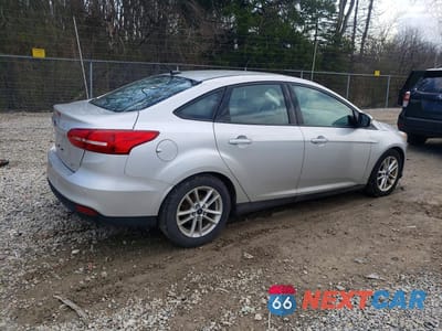 Trzecie zdjęcie samochodu z tyłu: 2016 FORD FOCUS SE VIN:1FADP3F24GL274596 - miniatura