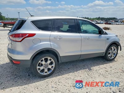 Trzecie zdjęcie samochodu z tyłu: 2013 FORD ESCAPE SEL VIN:1FMCU0HX7DUB39300 - miniatura