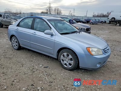 Czwarte zdjęcie samochodu z boku: 2006 KIA SPECTRA EX VIN:KNAFE121265347183 - miniatura