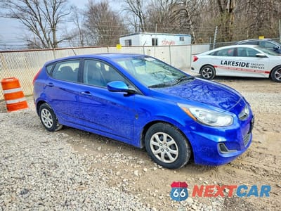Czwarte zdjęcie samochodu z boku: 2014 HYUNDAI ACCENT GS VIN:KMHCT5AE2EU186471 - miniatura