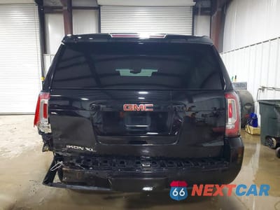 Zdjęcie 6 z 12 samochodu: 2018 GMC YUKON XL K1500 SLT VIN:1GKS2GKC3JR158773 - miniatura