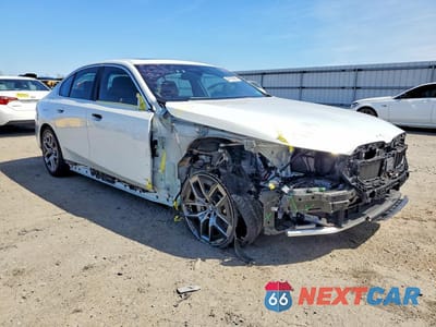 Czwarte zdjęcie samochodu z boku: 2026 BMW 530 XI VIN:WBA53FJ00TCV83104 - miniatura