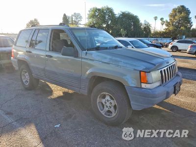 Czwarte zdjęcie samochodu z boku: 1996 JEEP GRAND CHEROKEE LAREDO VIN:1J4FX58SXTC294092 - miniatura
