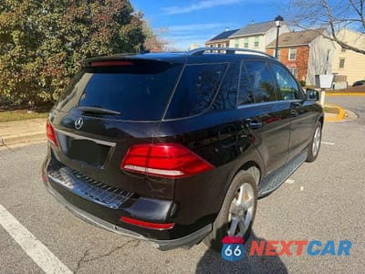 Czwarte zdjęcie samochodu z boku: 2016 MERCEDES-BENZ GLE 350 VIN:4JGDA5JB1GA659118 - miniatura