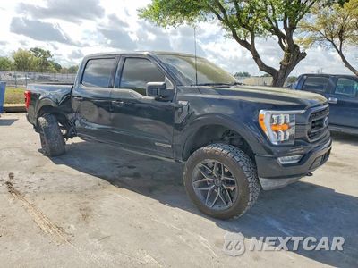 Czwarte zdjęcie samochodu z boku: 2023 FORD F150 SUPERCREW VIN:1FTFW1ED7PFD31000 - miniatura