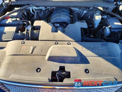 Zdjęcie 11 z 11 samochodu: 2015 GMC YUKON XL DENALI VIN:1GKS2JKJ0FR504605 - miniatura