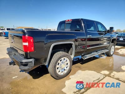 Trzecie zdjęcie samochodu z tyłu: 2017 GMC SIERRA K2500 DENALI VIN:1GT12UEG4HF161844 - miniatura