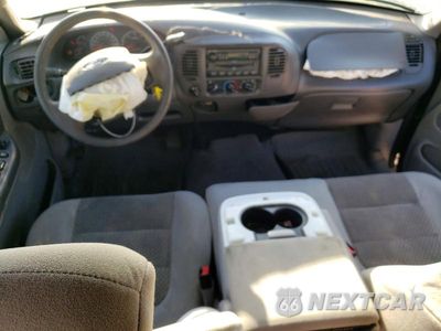 Zdjęcie 8 z 12 samochodu: 2003 FORD F150 SUPERCREW VIN:1FTRW08L83KD52613 - miniatura