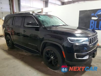 Czwarte zdjęcie samochodu z boku: 2022 JEEP WAGONEER SERIES I VIN:1C4SJVAT8NS206531 - miniatura