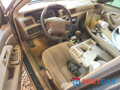 Zdjęcie 8 z 12 samochodu: 1997 TOYOTA CAMRY LE VIN:4T1BG22K9VU034416 - miniatura