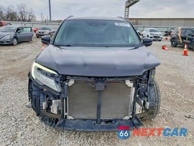 Piąte zdjęcie samochodu w środku: 2019 HONDA PILOT TOURING VIN:5FNYF6H93KB040357 - miniatura