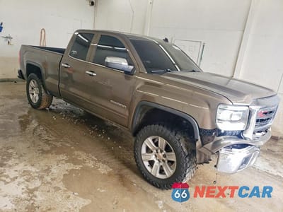 Czwarte zdjęcie samochodu z boku: 2014 GMC SIERRA C1500 SLE VIN:1GTR1UEC1EZ128362 - miniatura