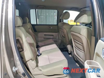 Zdjęcie 11 z 12 samochodu: 2011 HONDA PILOT EX VIN:5FNYF4H41BB012436 - miniatura