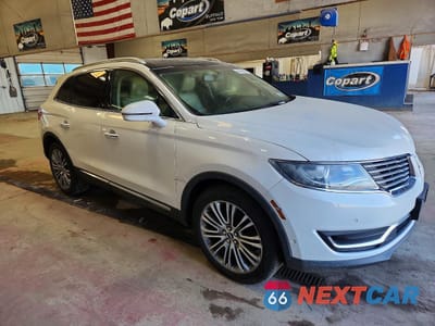Czwarte zdjęcie samochodu z boku: 2016 LINCOLN MKX RESERVE VIN:2LMTJ8LR0GBL80372 - miniatura