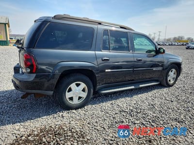 Trzecie zdjęcie samochodu z tyłu: 2003 CHEVROLET TRAILBLAZER EXT VIN:1GNET16S836139250 - miniatura