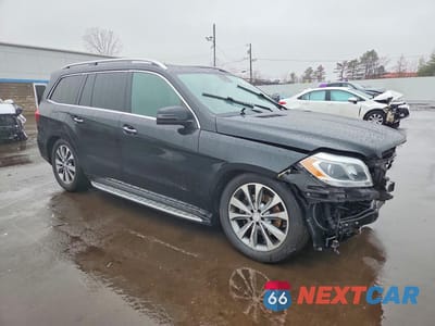 Czwarte zdjęcie samochodu z boku: 2015 MERCEDES-BENZ GL 450 4MATIC VIN:4JGDF6EE2FA494979 - miniatura