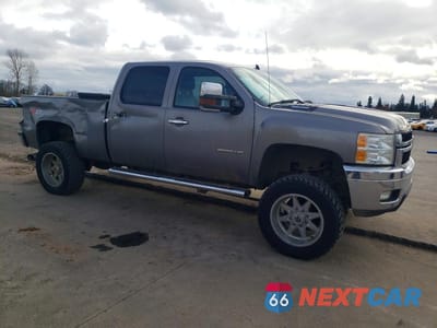 Czwarte zdjęcie samochodu z boku: 2013 CHEVROLET SILVERADO K2500 HEAVY DUTY LT VIN:1GC1KXC88DF224449 - miniatura