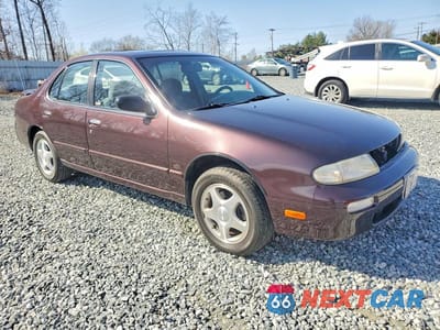 Czwarte zdjęcie samochodu z boku: 1997 NISSAN ALTIMA XE VIN:1N4BU31D5VC151525 - miniatura