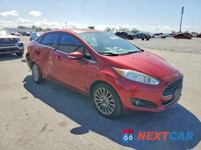Czwarte zdjęcie samochodu z boku: 2014 FORD FIESTA TITANIUM VIN:3FADP4CJ9EM150806 - miniatura