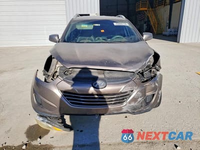 Piąte zdjęcie samochodu w środku: 2011 HYUNDAI TUCSON GLS VIN:KM8JU3AC8BU173940 - miniatura