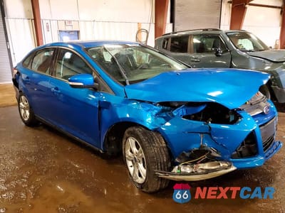 Czwarte zdjęcie samochodu z boku: 2014 FORD FOCUS SE VIN:1FADP3F27EL174585 - miniatura