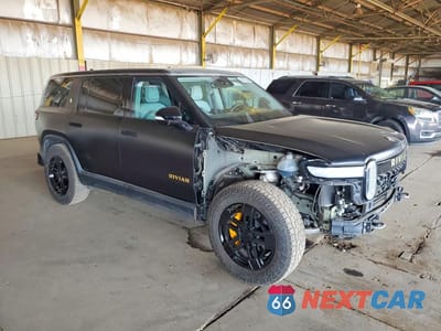 Czwarte zdjęcie samochodu z boku: 2023 RIVIAN R1S ADVENTURE VIN:7PDSGABA6PN019237 - miniatura