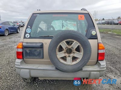 Zdjęcie 6 z 14 samochodu: 2003 CHEVROLET TRACKER VIN:2CNBJ13C336946263 - miniatura