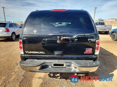 Zdjęcie 6 z 12 samochodu: 2000 GMC YUKON XL K1500 VIN:3GKFK16TXYG200911 - miniatura