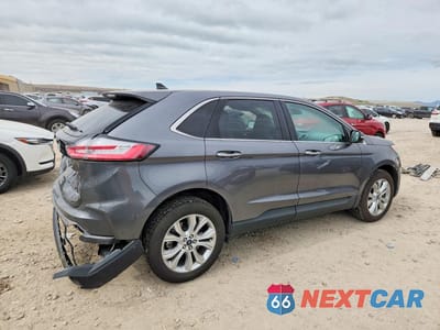 Trzecie zdjęcie samochodu z tyłu: 2021 FORD EDGE TITANIUM VIN:2FMPK4K94MBA26919 - miniatura