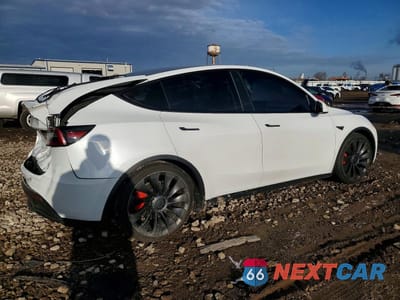 Trzecie zdjęcie samochodu z tyłu: 2022 TESLA MODEL Y VIN:7SAYGDEF5NF394903 - miniatura