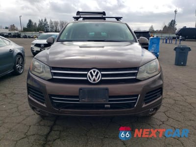 Piąte zdjęcie samochodu w środku: 2011 VOLKSWAGEN TOUAREG V6 TDI VIN:WVGFK9BP4BD007298 - miniatura