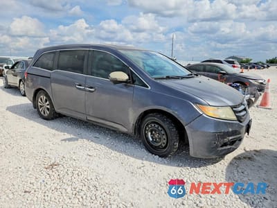 Czwarte zdjęcie samochodu z boku: 2014 HONDA ODYSSEY EXL VIN:5FNRL5H6XEB052068 - miniatura