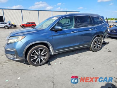 2019 HONDA PILOT TOURING 5FNYF5H64KB003267 - główne zdjęcie licytacji z USA - miniatura