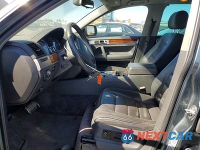 Zdjęcie 7 z 12 samochodu: 2005 VOLKSWAGEN TOUAREG 4.2 VIN:WVGMM77L55D009108 - miniatura