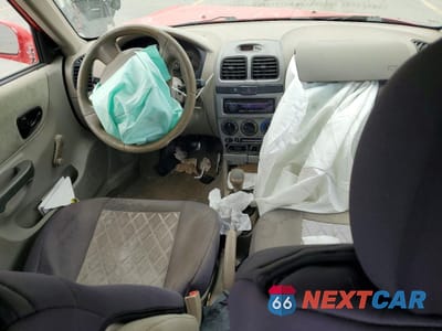 Zdjęcie 8 z 13 samochodu: 2003 HYUNDAI ACCENT GL VIN:KMHCG45C73U460199 - miniatura