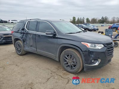 Czwarte zdjęcie samochodu z boku: 2019 CHEVROLET TRAVERSE LT VIN:1GNEVGKW7KJ134560 - miniatura