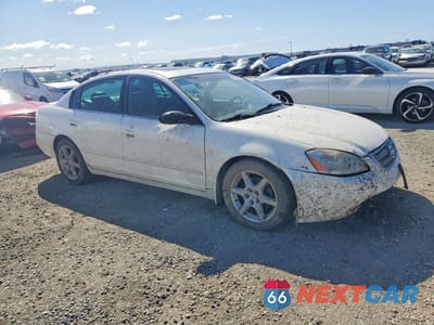 Czwarte zdjęcie samochodu z boku: 2003 NISSAN ALTIMA 3.5 SE VIN:1N4BL11DX3C150018 - miniatura