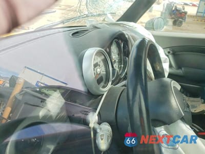 Zdjęcie 9 z 12 samochodu: 2005 MINI COOPER VIN:WMWRC33545TJ70632 - miniatura