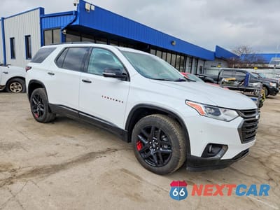 Czwarte zdjęcie samochodu z boku: 2020 CHEVROLET TRAVERSE PREMIER VIN:1GNEVKKW9LJ233174 - miniatura