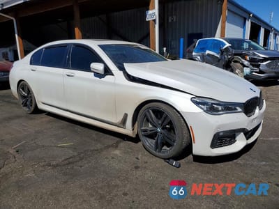 Czwarte zdjęcie samochodu z boku: 2016 BMW 750 XI VIN:WBA7F2C56GG415631 - miniatura