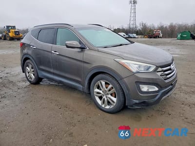 Czwarte zdjęcie samochodu z boku: 2013 HYUNDAI SANTA FE SPORT 2.0T VIN:5XYZUDLA6DG092478 - miniatura