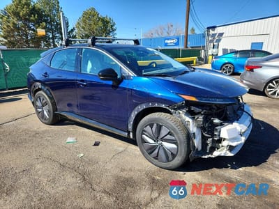 Czwarte zdjęcie samochodu z boku: 2023 NISSAN ARIYA EVOLVE+ E-4ORCE VIN:JN1DF0BBXPM709281 - miniatura