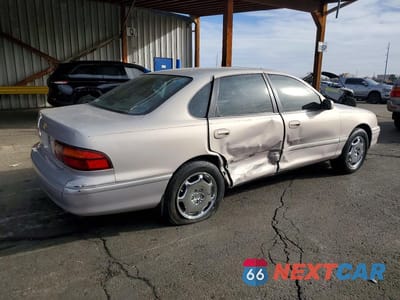 Trzecie zdjęcie samochodu z tyłu: 1999 TOYOTA AVALON XLS VIN:4T1BF18B4XU302456 - miniatura